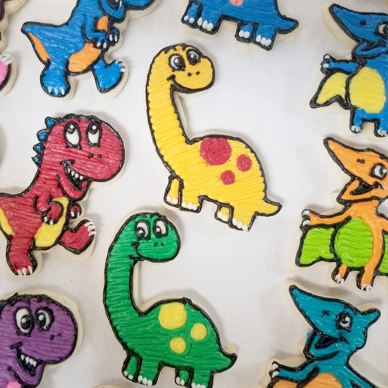 Whimsical Cartoon Dinosaur Cookies