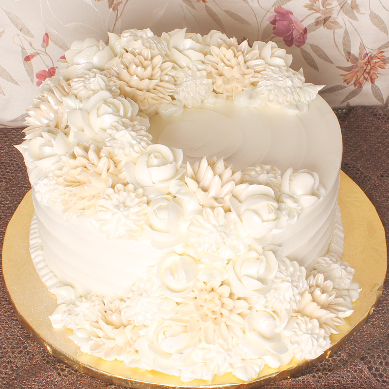 White and Ivory Cascading Flowers Cake