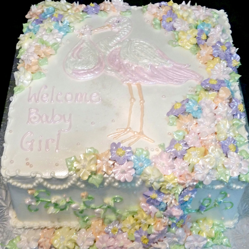 Cascading Flowers With Stork Baby Shower Cake