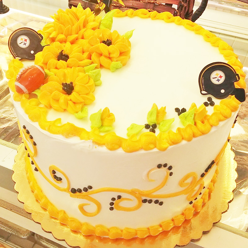 Pittsburgh Steelers Footballs And Flowers Cake