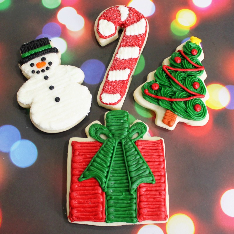 Christmas Iced Cutout Cookies. Snowman, Present, Christmas Tree, Candy Cane